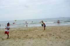 Playing football on Cua Dai Beach