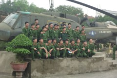 Proudly posing in front of war trophy